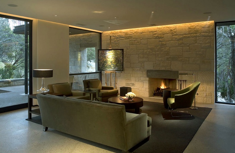 Strategic lighting showcases textured living room walls